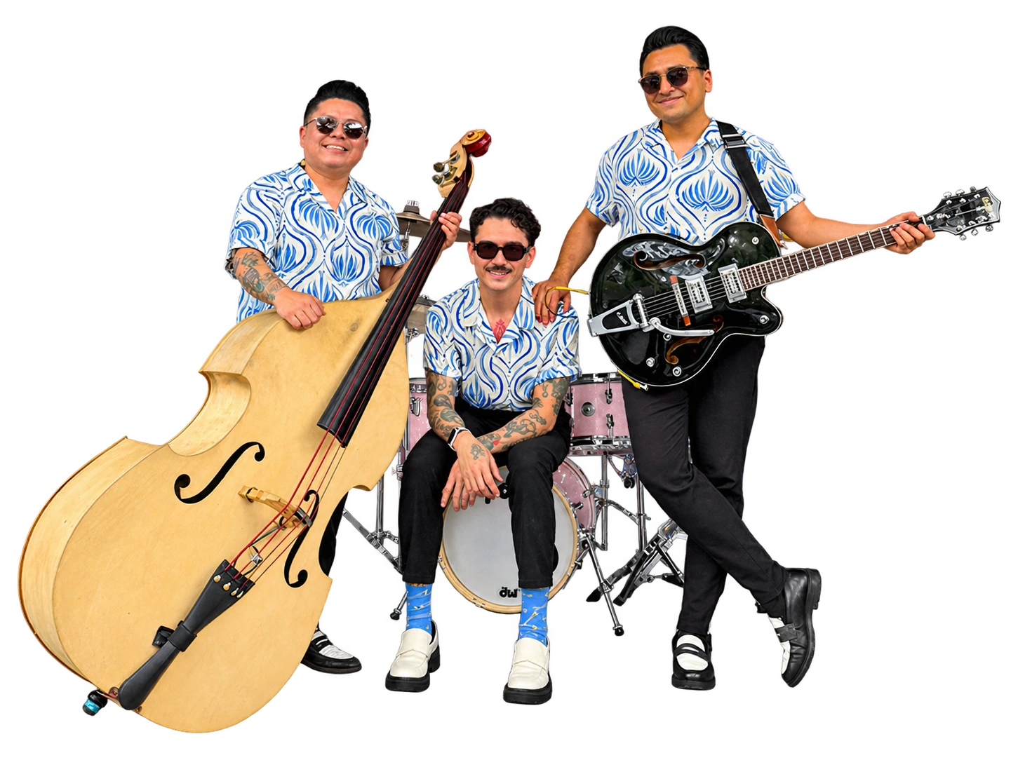 Los tres integrantes de Los Cocodrilos Rockabilly con contrabajo, batería y guitarra